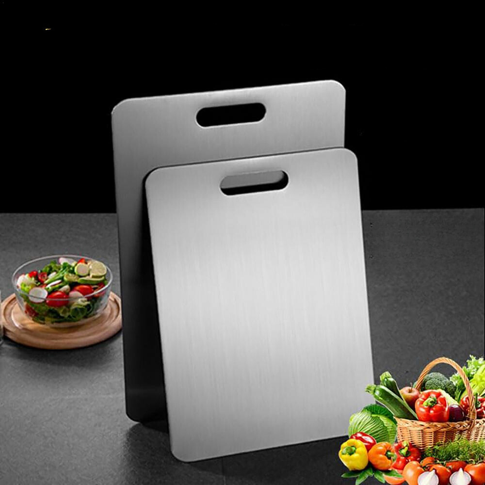 Brushed Titanium Cutting Board with vegetables on a modern kitchen counter